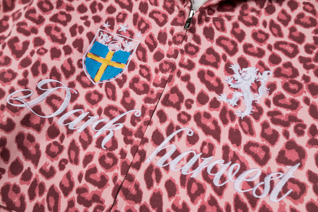 Vesteà motif léopard, zippée, à capuche, coupe ample et épaules tombantes