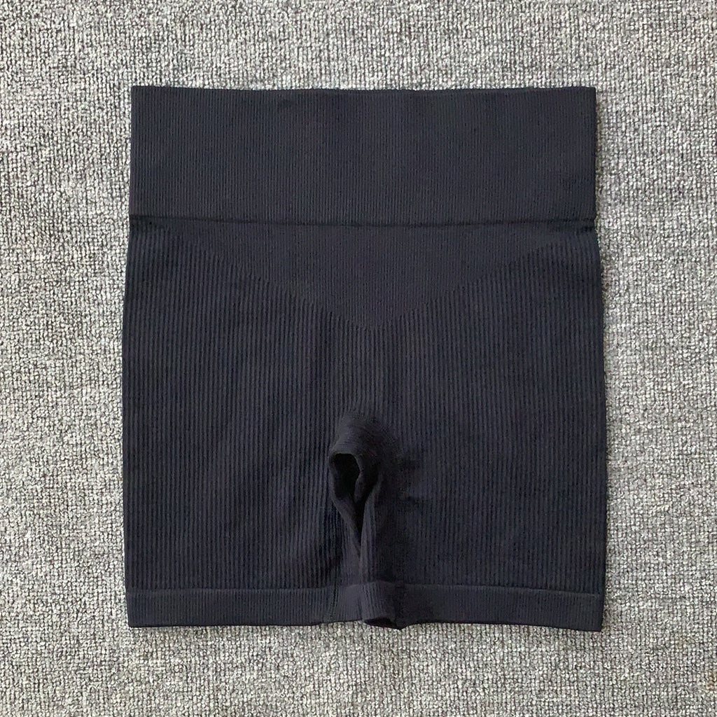 Ensemble de sport pour la course à pied, le yoga et le fitness, composé d'un t-shirt moulant taille haute dos nu et sans coutures côtelé à manches longues et de vêtements de sport à séchage rapide.