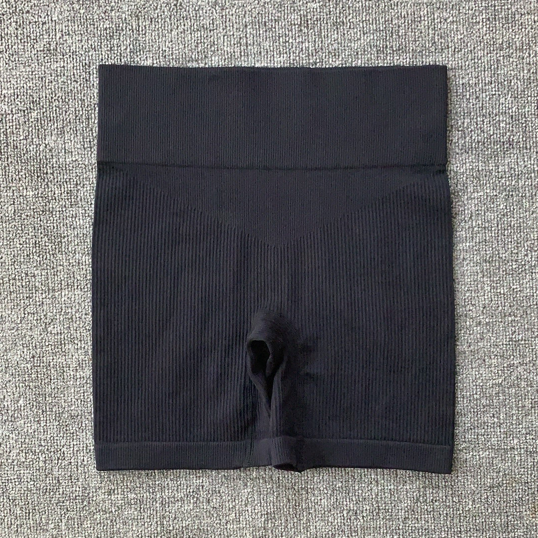Ensemble de sport pour la course à pied, le yoga et le fitness, composé d'un t-shirt moulant taille haute dos nu et sans coutures côtelé à manches longues et de vêtements de sport à séchage rapide.
