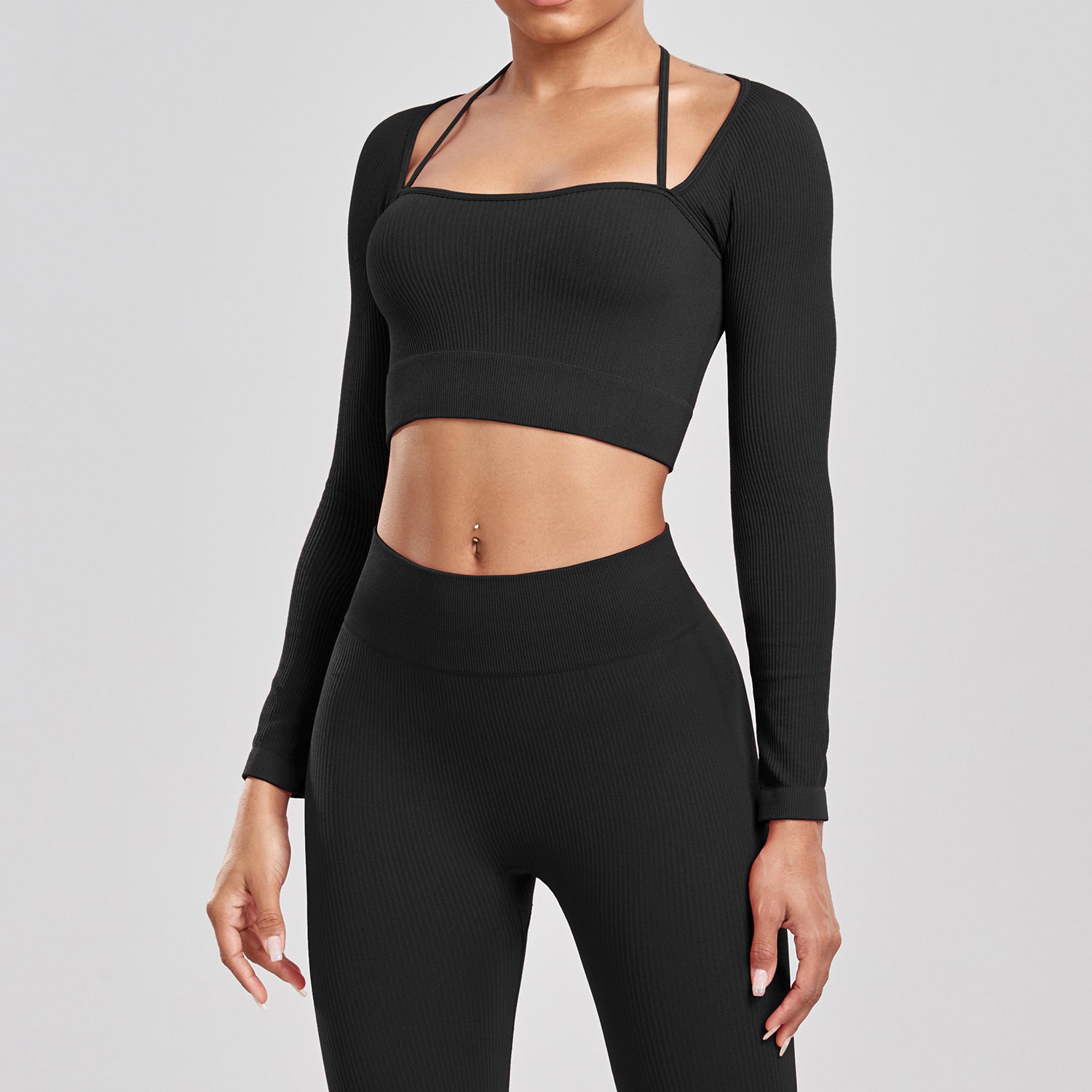 Ensemble de sport pour la course à pied, le yoga et le fitness, composé d'un t-shirt moulant taille haute dos nu et sans coutures côtelé à manches longues et de vêtements de sport à séchage rapide.