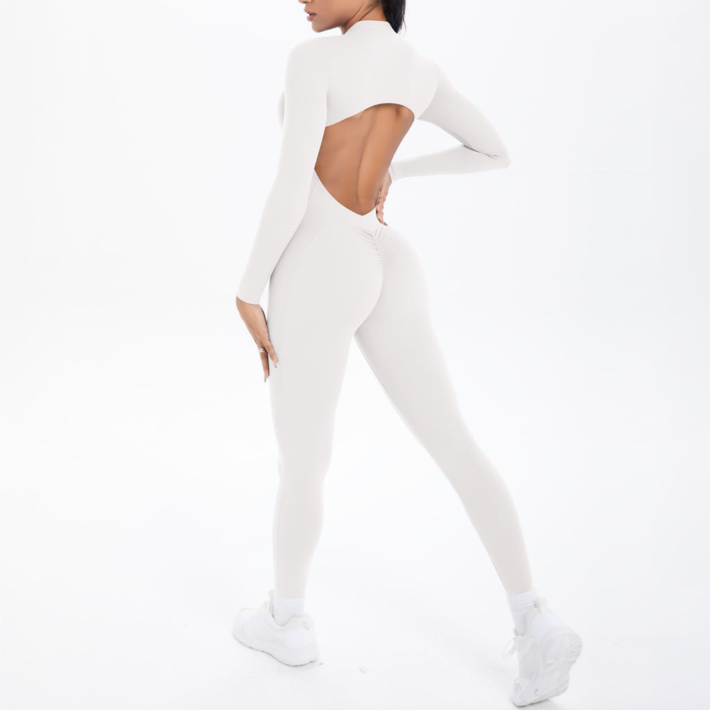 Combinaison de yoga style demi-zip, coupe ajustée effet seconde peau, manches longues et pantalon long, tenue de yoga très élastique.