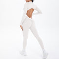 Combinaison de yoga style demi-zip, coupe ajustée effet seconde peau, manches longues et pantalon long, tenue de yoga très élastique.