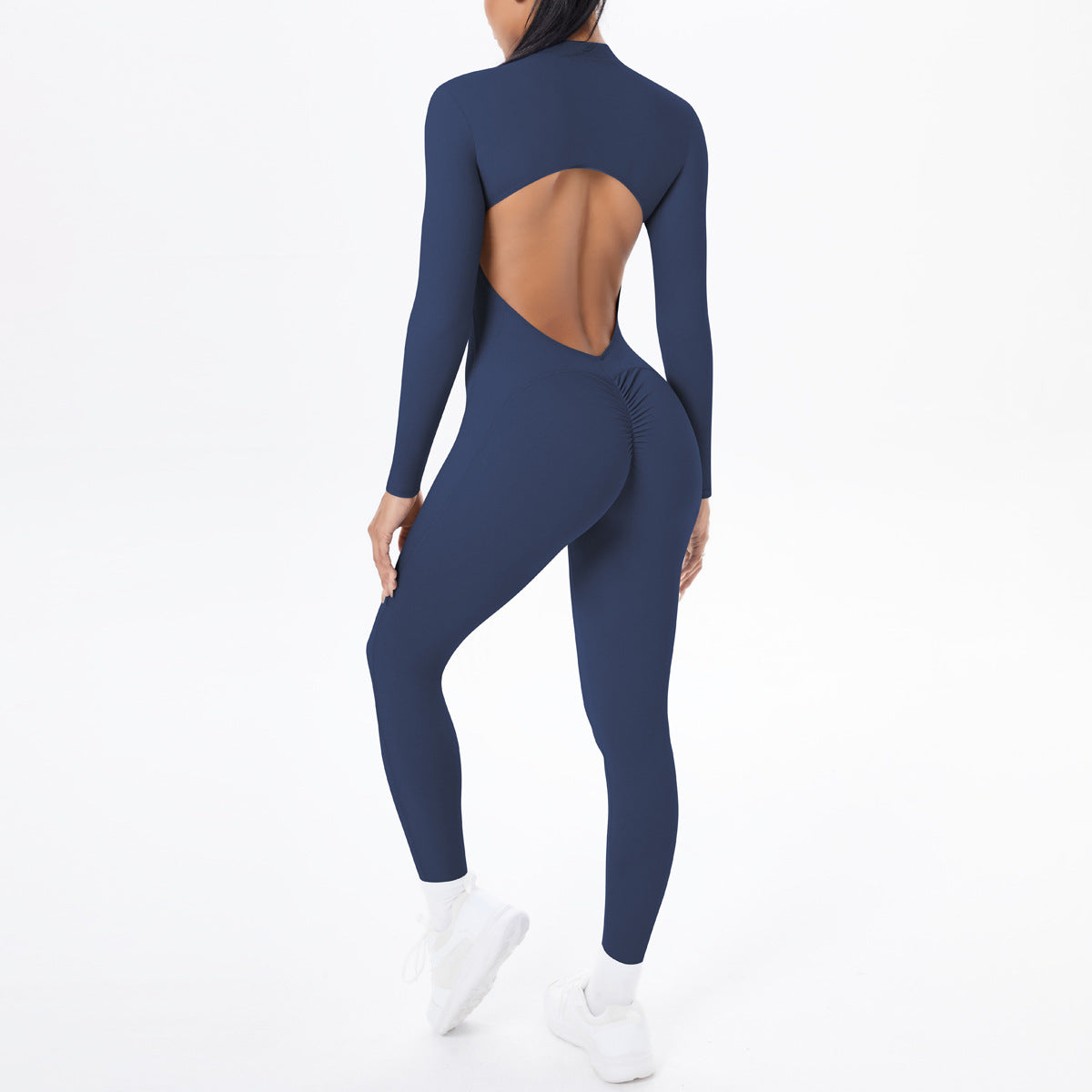 Combinaison de yoga style demi-zip, coupe ajustée effet seconde peau, manches longues et pantalon long, tenue de yoga très élastique.
