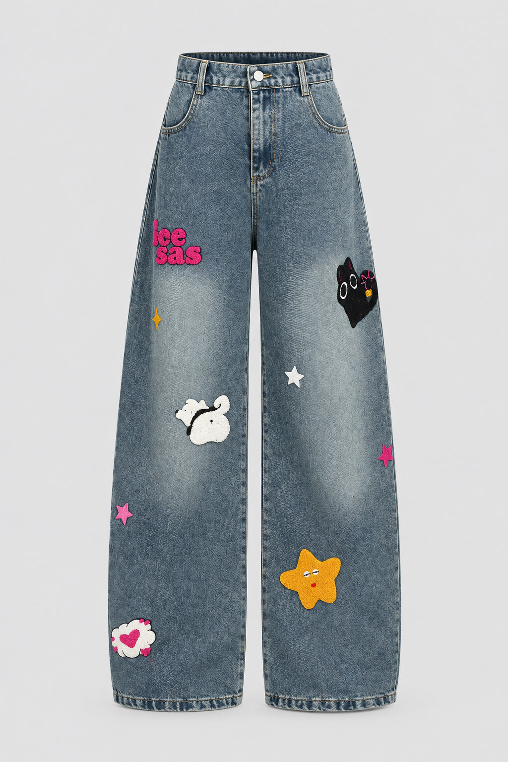 Pantalon en denim délavé à découpes incurvées