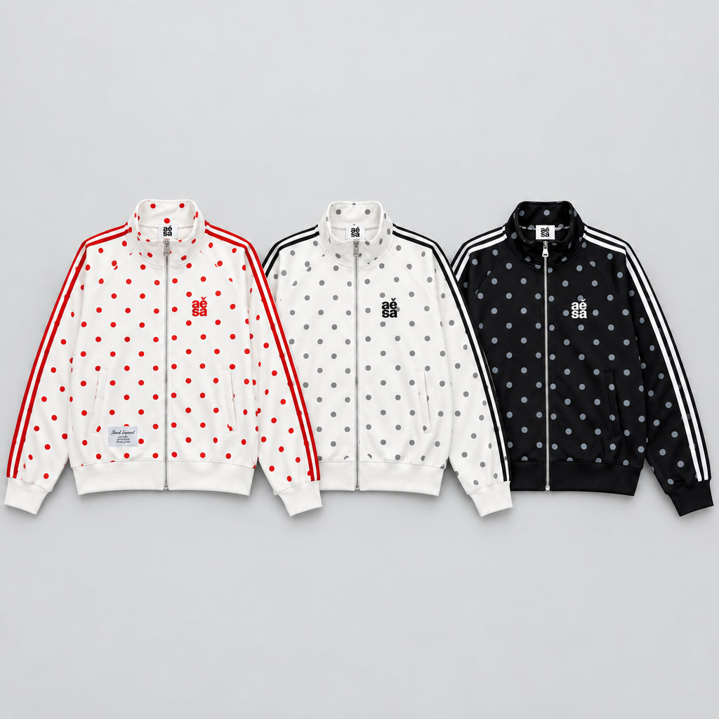 Gilet  à motif pois intégral, col montant et fermeture zippée