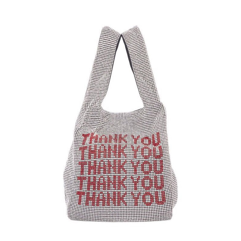 Sac à main à main avec strass et incrustations de diamants