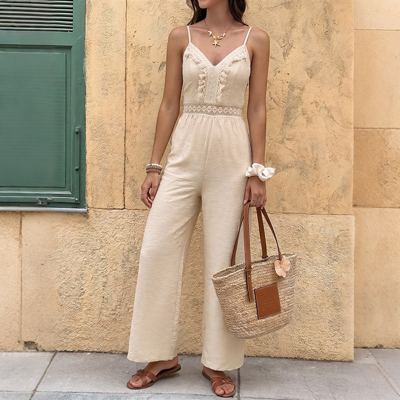 Combinaison pantalon long en dentelle unie douce au toucher, ornée de pompons et de bretelles côtelées
