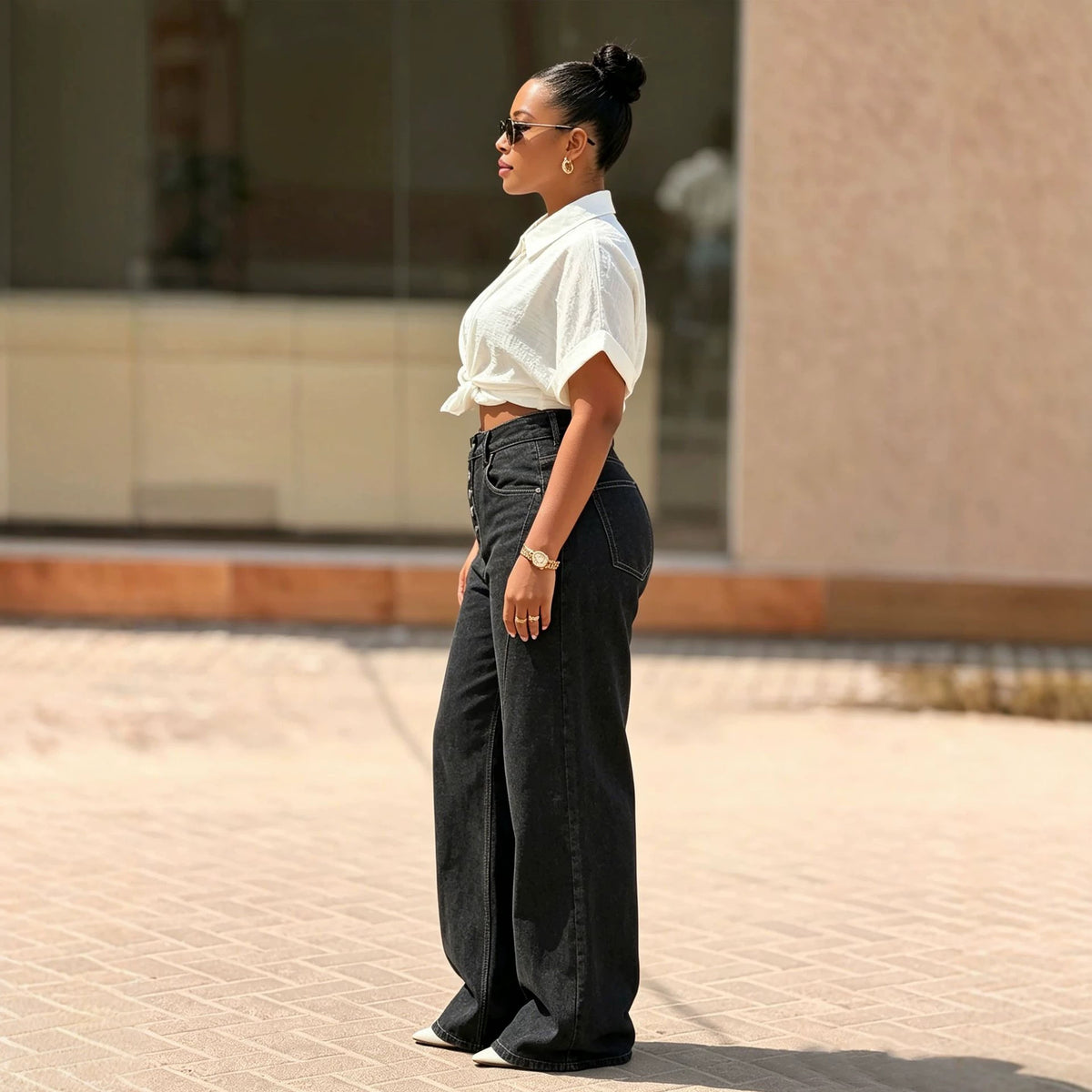 Pantalon en jean avec surpiqûres et fermeture à boutons multiples
