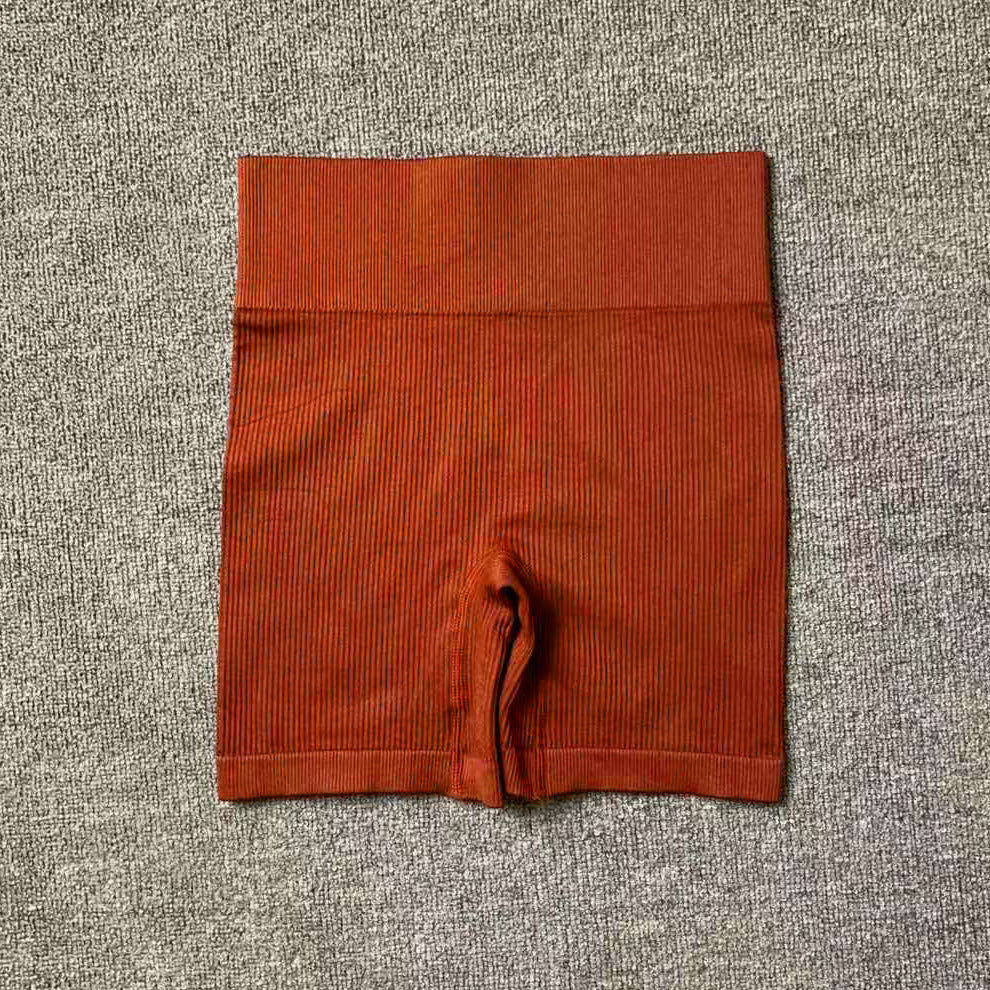 Ensemble de sport pour la course à pied, le yoga et le fitness, composé d'un t-shirt moulant taille haute dos nu et sans coutures côtelé à manches longues et de vêtements de sport à séchage rapide.