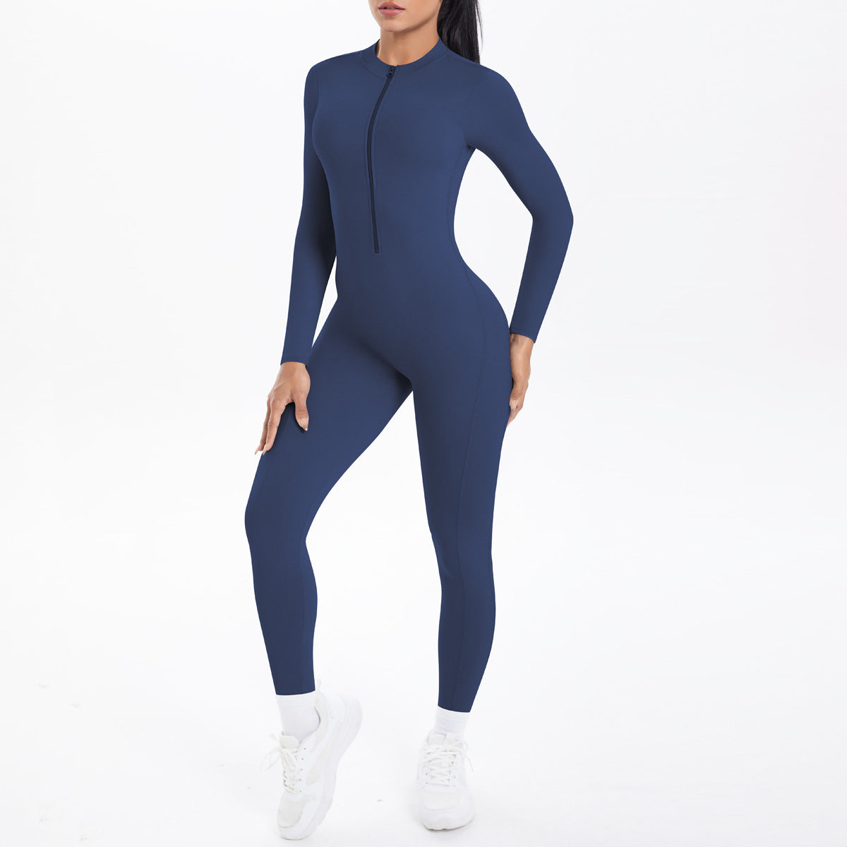 Combinaison de yoga style demi-zip, coupe ajustée effet seconde peau, manches longues et pantalon long, tenue de yoga très élastique.