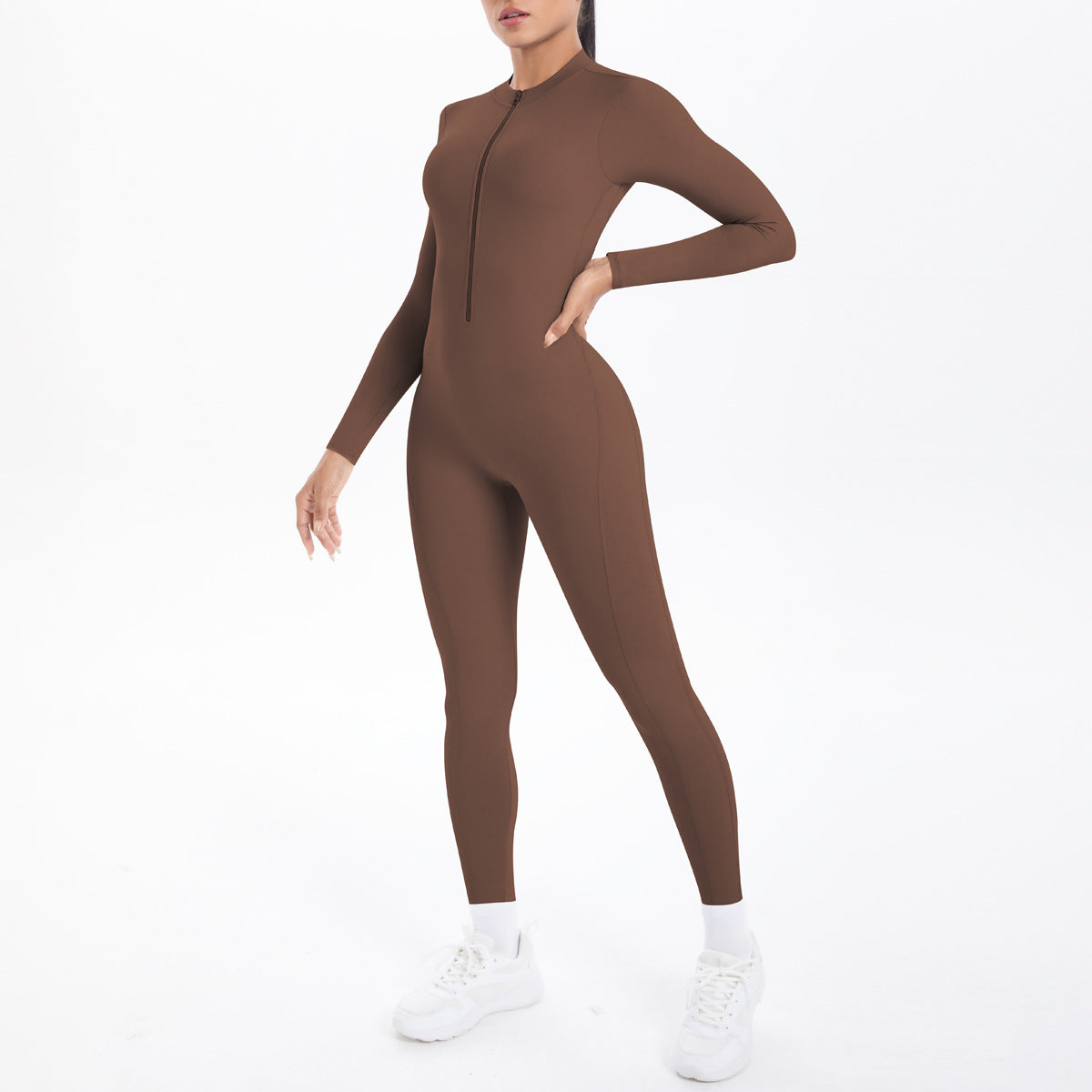 Combinaison de yoga style demi-zip, coupe ajustée effet seconde peau, manches longues et pantalon long, tenue de yoga très élastique.