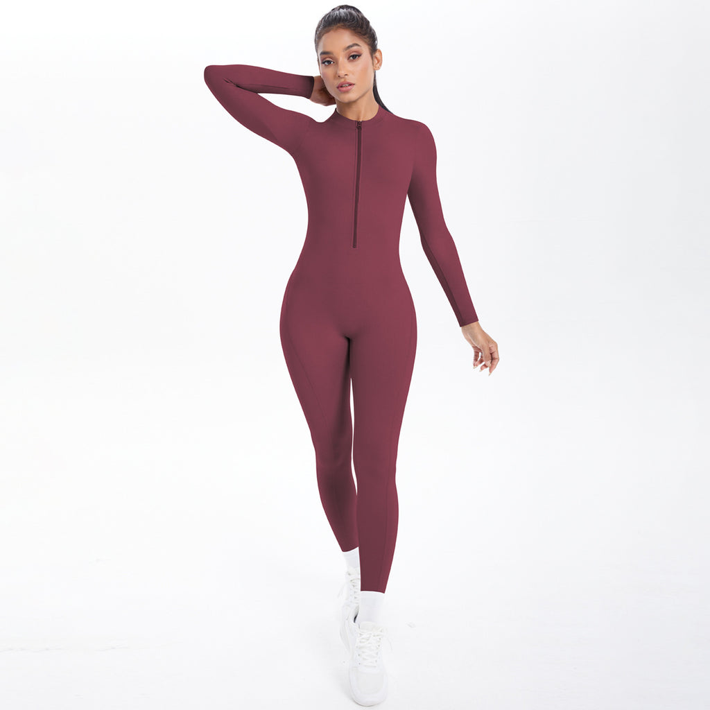 Combinaison de yoga style demi-zip, coupe ajustée effet seconde peau, manches longues et pantalon long, tenue de yoga très élastique.