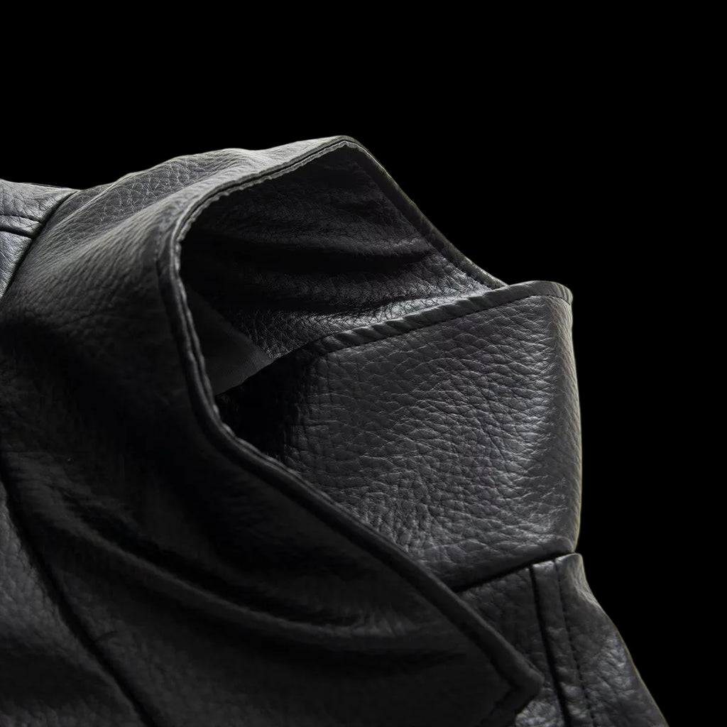 Veste à col montant, fermeture éclair latérale et taille ajustée