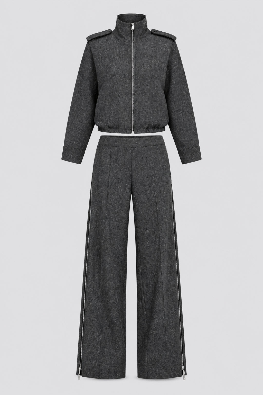 Ensemble veste et pantalon avec fermeture éclair latérale et détails à brides