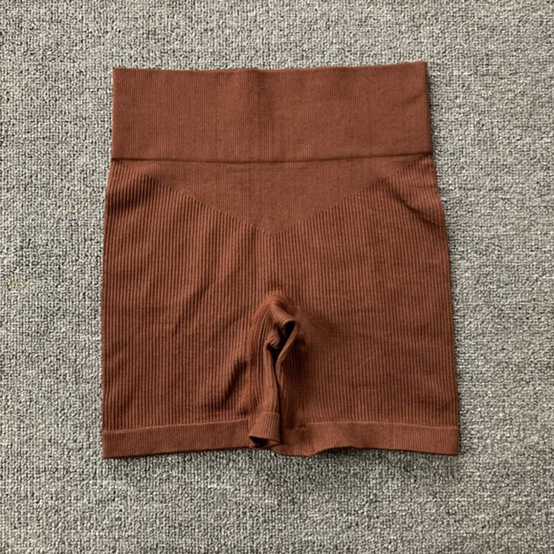 Ensemble de sport pour la course à pied, le yoga et le fitness, composé d'un t-shirt moulant taille haute dos nu et sans coutures côtelé à manches longues et de vêtements de sport à séchage rapide.