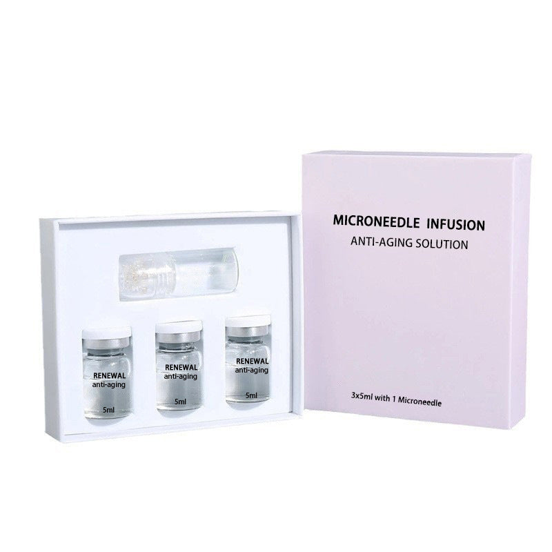 Coffret de soins pour le visage : essence hydratante, nourrissante et anti-rides, avec applicateur à bille et nettoyant.