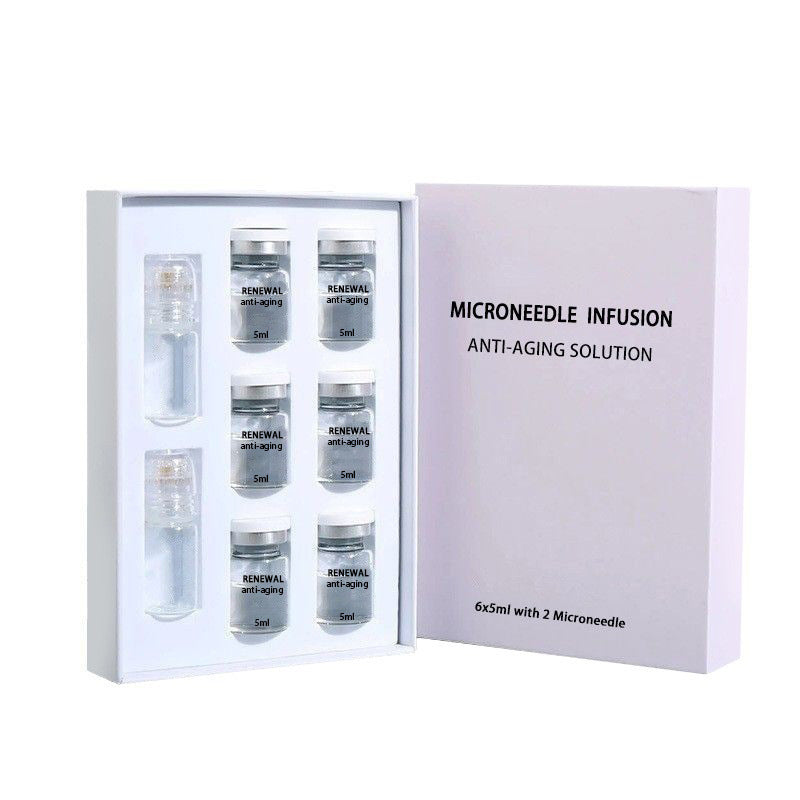 Coffret de soins pour le visage : essence hydratante, nourrissante et anti-rides, avec applicateur à bille et nettoyant.