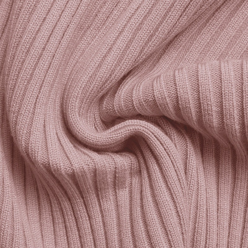 Robe en maille avec manches gigot et fente latérale