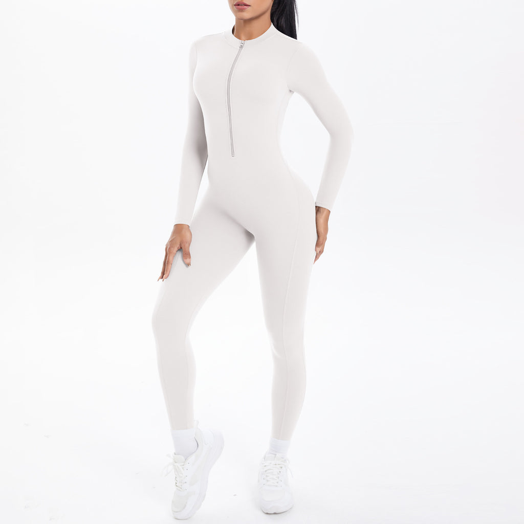 Combinaison de yoga style demi-zip, coupe ajustée effet seconde peau, manches longues et pantalon long, tenue de yoga très élastique.