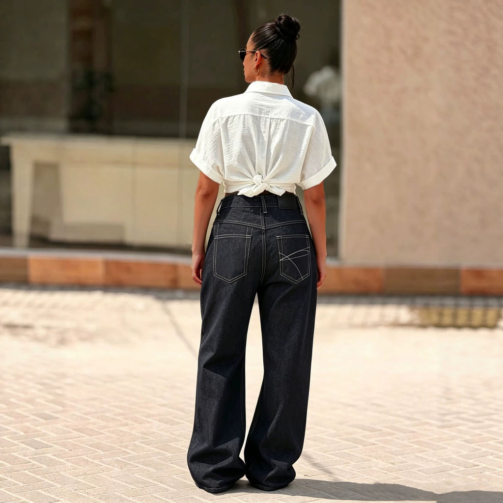 Pantalon en jean avec surpiqûres et fermeture à boutons multiples