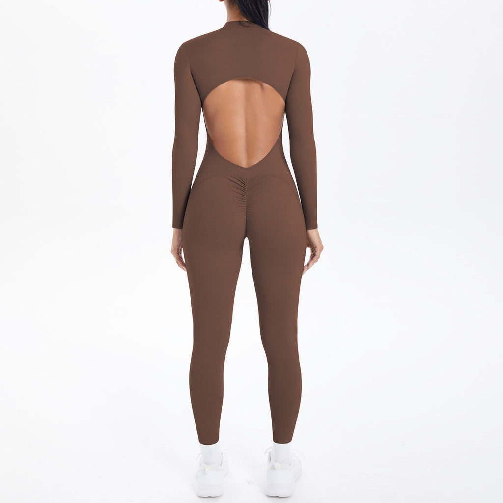Combinaison de yoga style demi-zip, coupe ajustée effet seconde peau, manches longues et pantalon long, tenue de yoga très élastique.