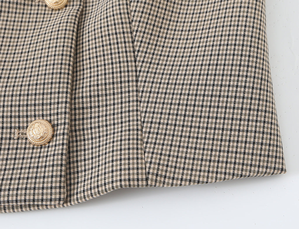 Ensemble : Gilet à carreaux sans manches à double boutonnage et d'un pantalon long.