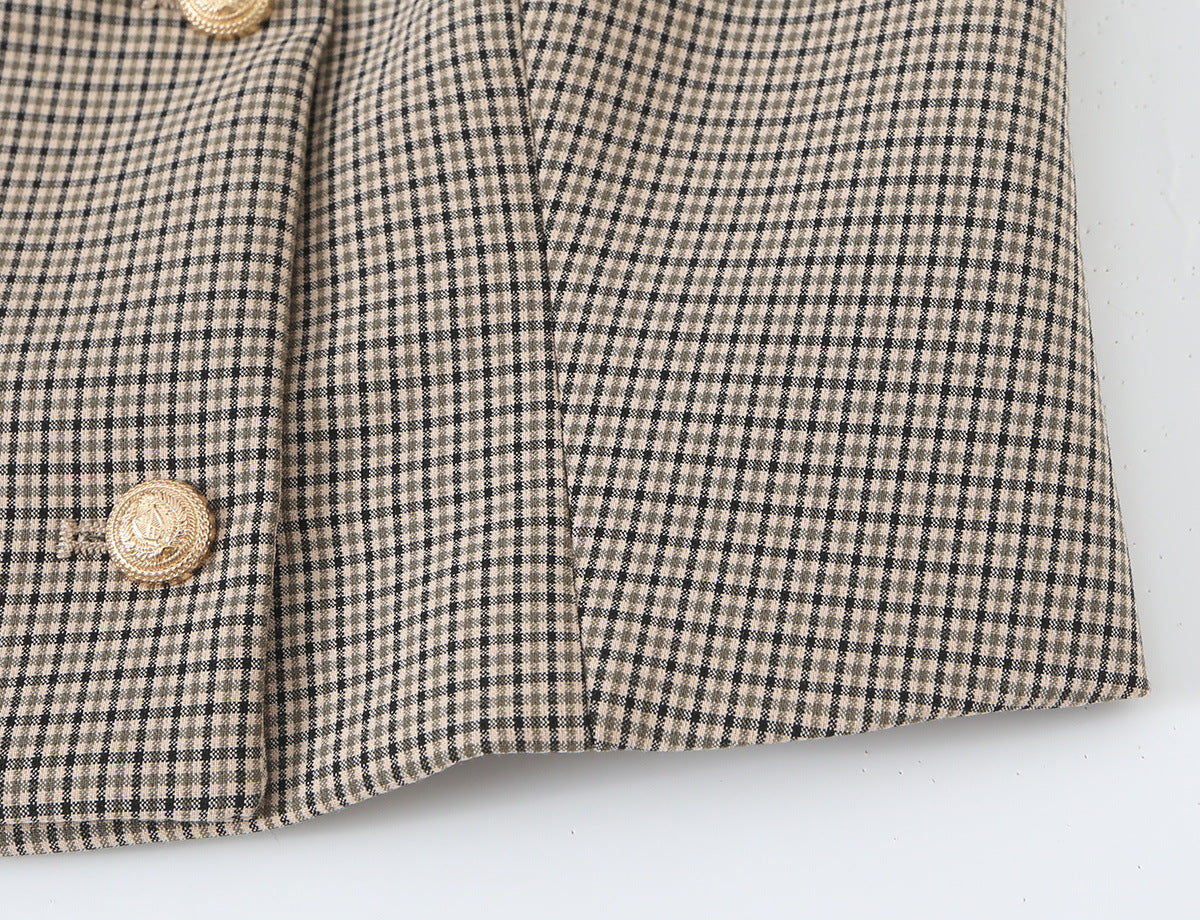 Ensemble : Gilet à carreaux sans manches à double boutonnage et d'un pantalon long.