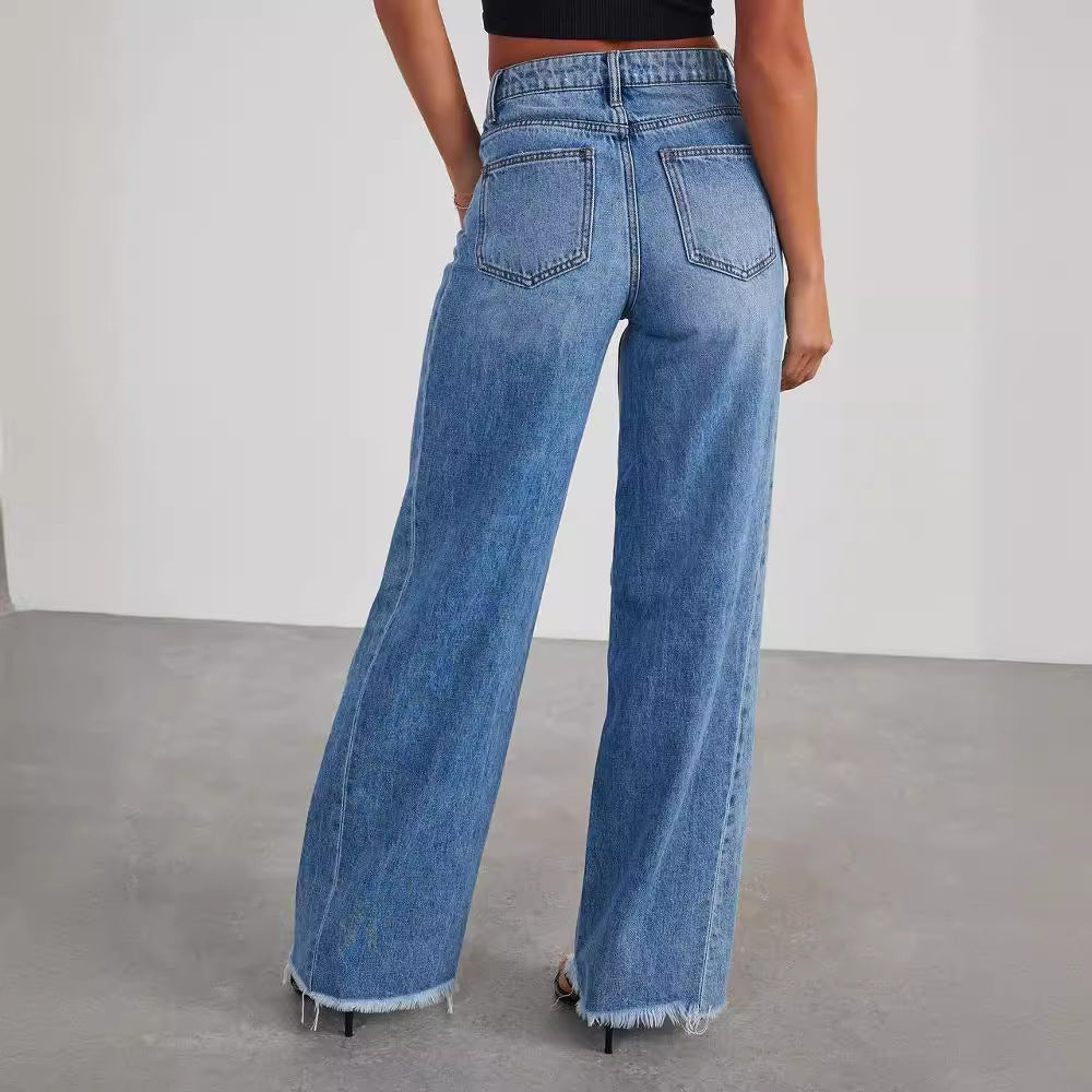 Jean pour femme à coupe large et jambes amples, avec empiècements latéraux et ourlet brossé