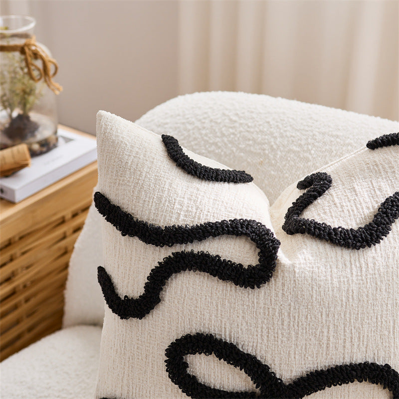 Housse de coussin brodée