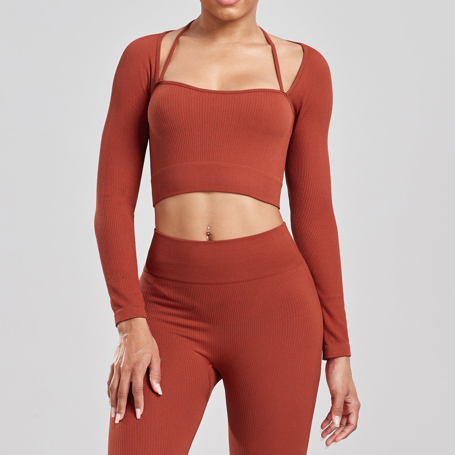Ensemble de sport pour la course à pied, le yoga et le fitness, composé d'un t-shirt moulant taille haute dos nu et sans coutures côtelé à manches longues et de vêtements de sport à séchage rapide.